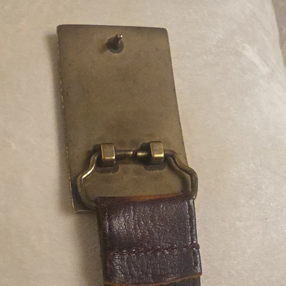 Linea Pelle Dark Brown Leather Belt with Brass-Tone Embossed Buckle